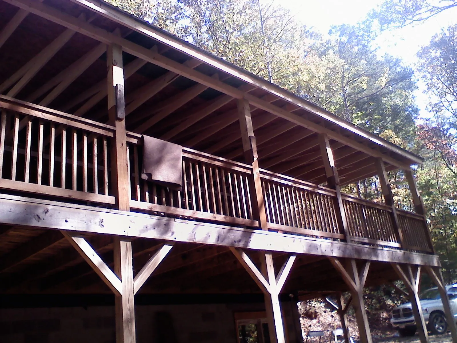 Timber framing under a new elevated porch and deck — Roof Leak Repair in Dakota City by Roofing Brothers